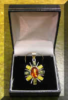 AM50BroochSun.jpeg (45630 bytes)